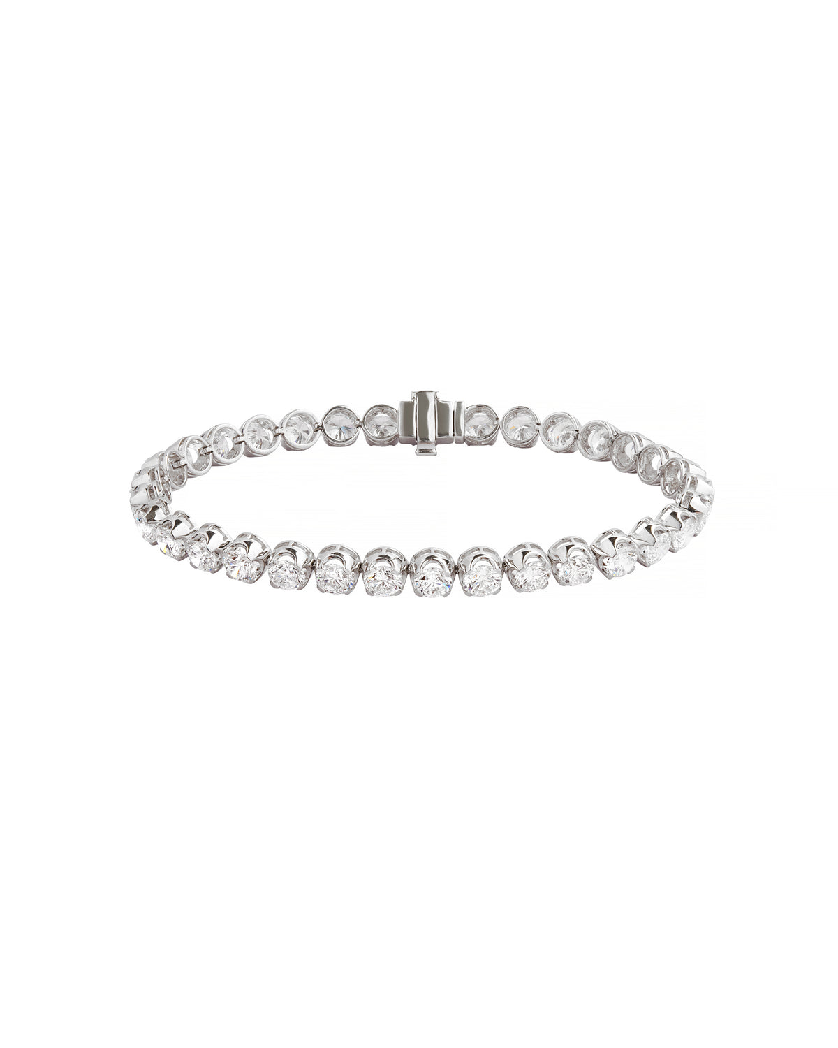 Silver bracelet with clear stones on a white background