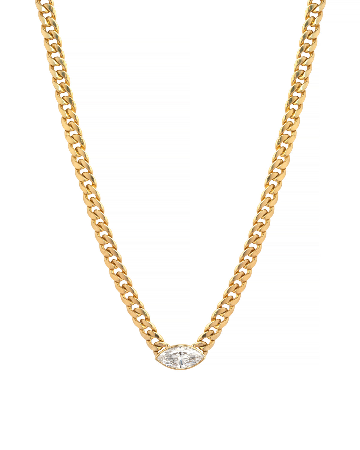 Gold chain necklace with a clear gemstone on a white background