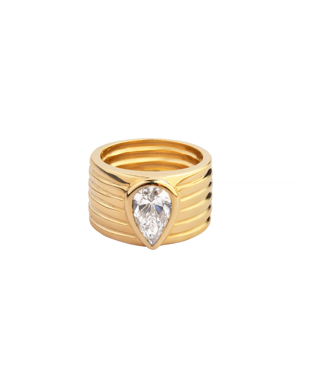 Gold ring with a pear-shaped diamond on a white background
